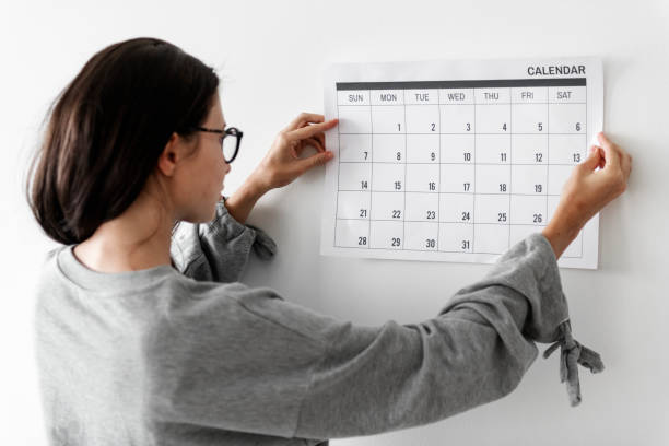 woman looking at calender